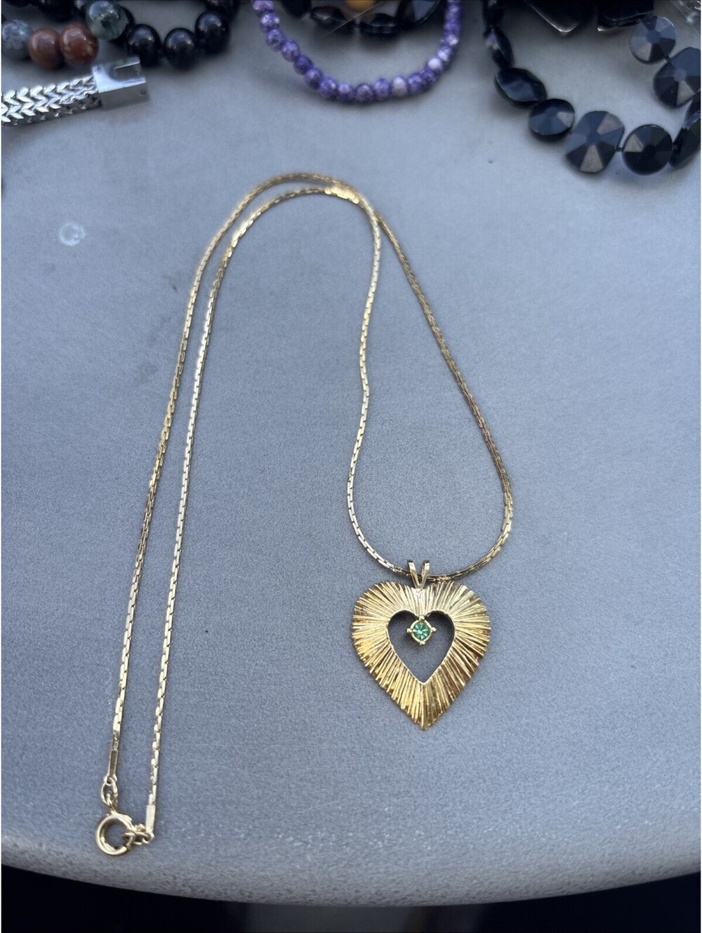 Vintage Avon Gold-Tone Necklace With Green Rhinestone Set In A Heart Pendant